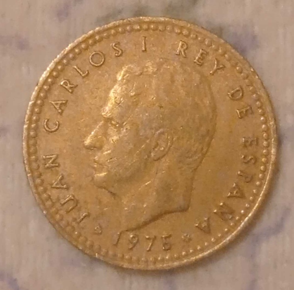 Moneda española 1 peseta de Juan Carlos I y detrás el símbolo del régimen franquista año 1975 *80 (MBC)