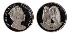 2 pounds (Emperor penguin)
